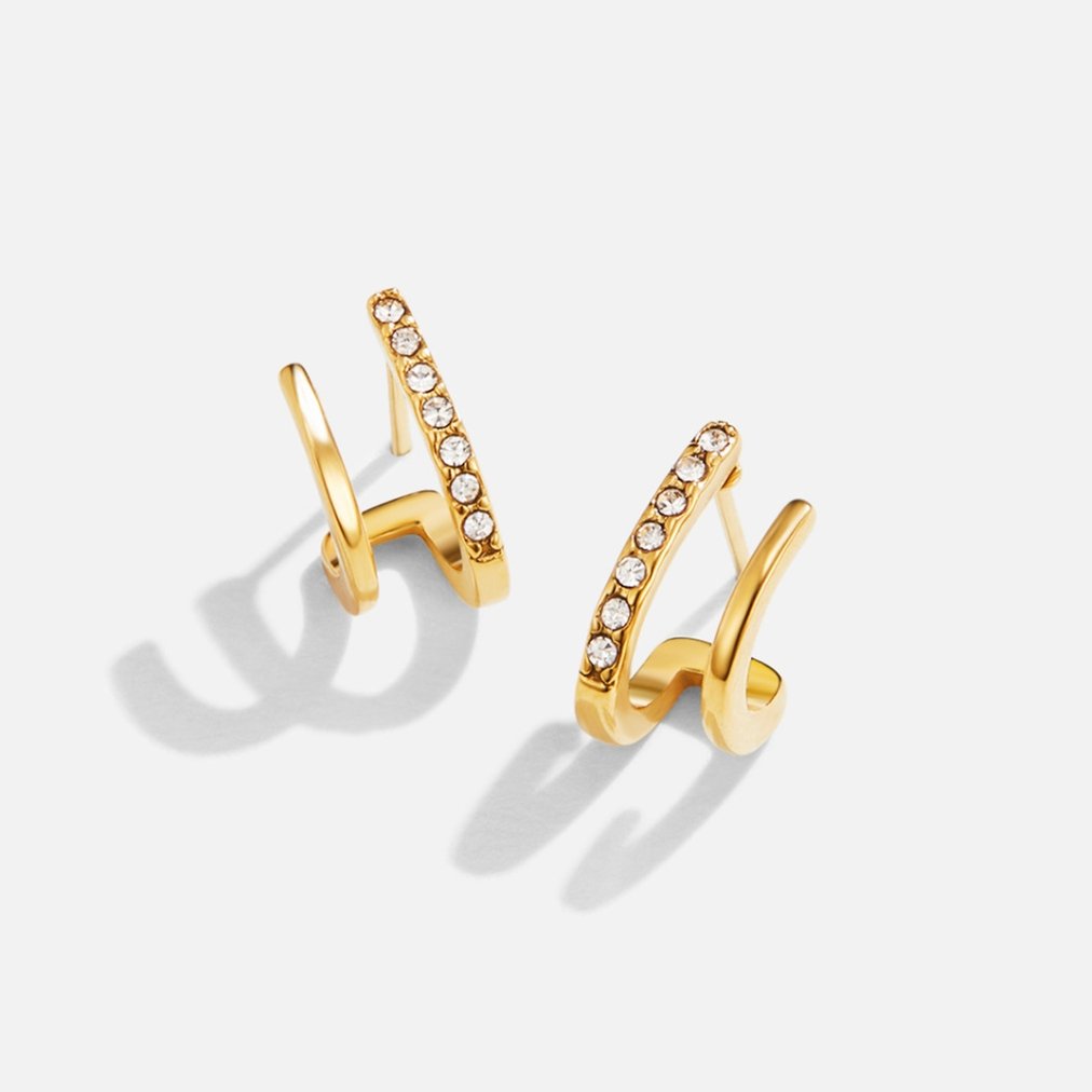 Brincos de garra em ouro 18K e cristal