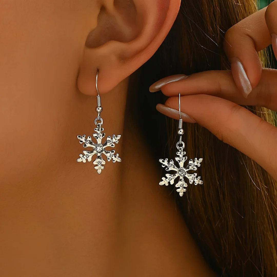 Brincos pendentes elegantes com flocos de neve natalinos