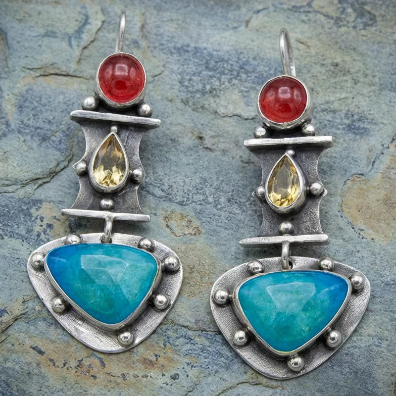 Brincos vintage com zircão azul em forma de gota de água