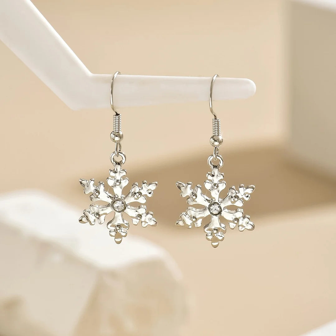 Brincos pendentes elegantes com flocos de neve natalinos