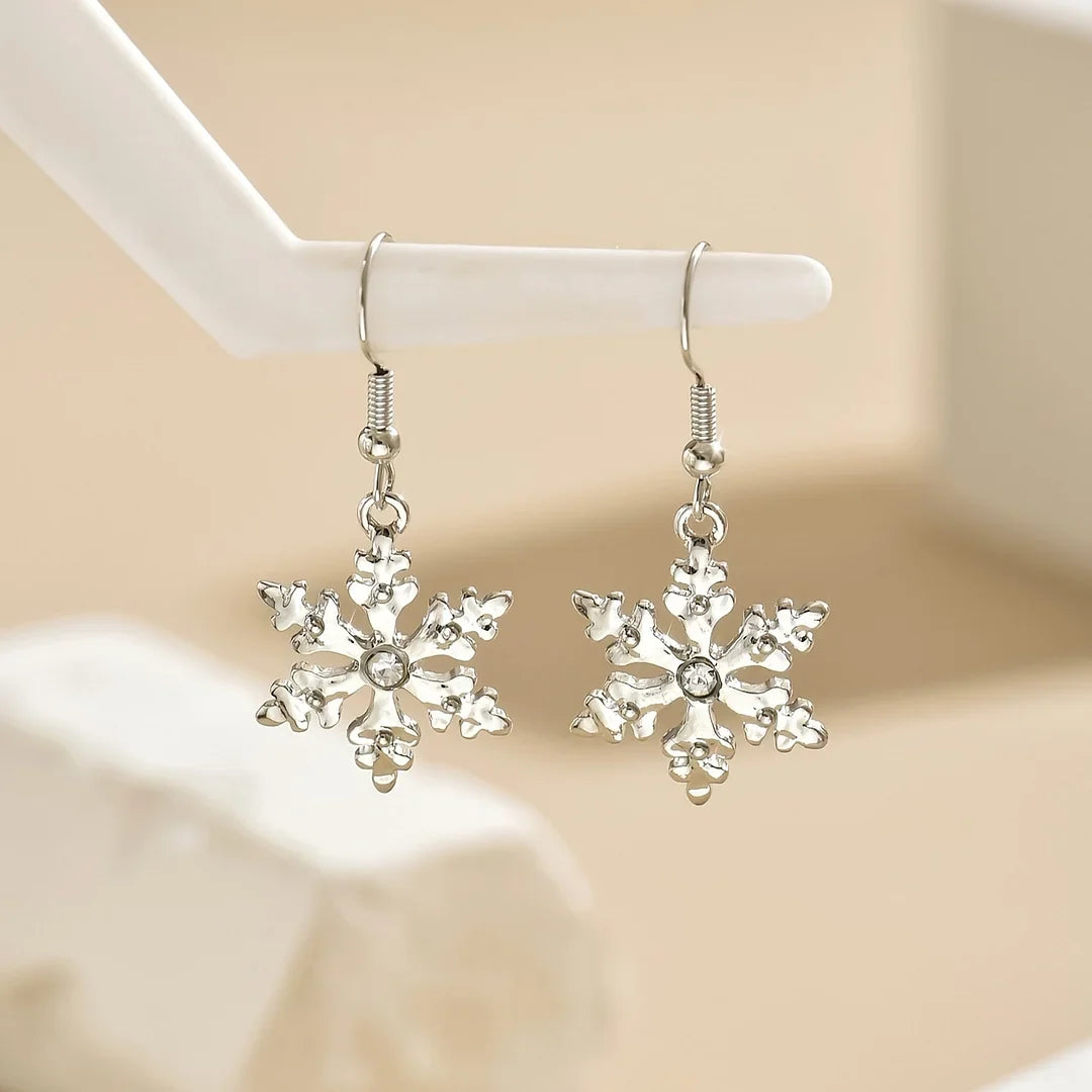 Brincos pendentes elegantes com flocos de neve natalinos