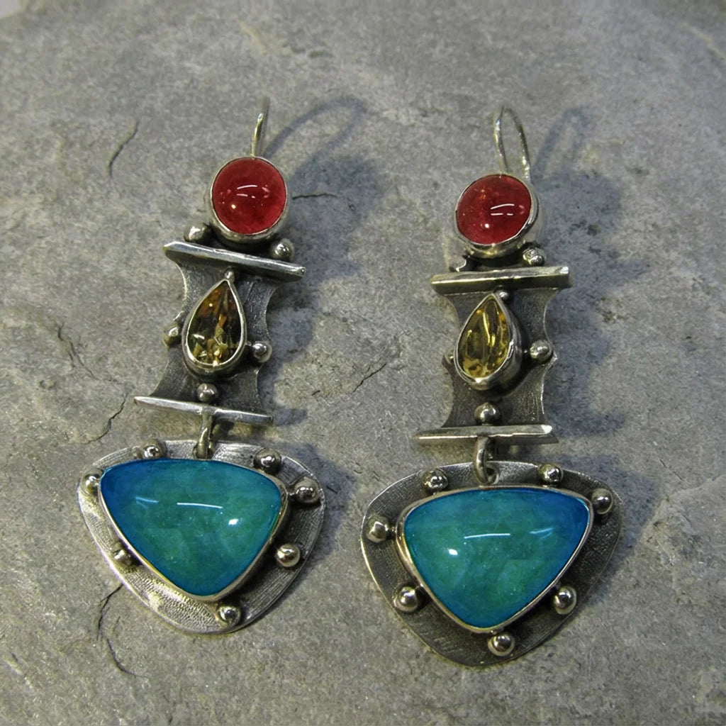 Brincos vintage com zircão azul em forma de gota de água