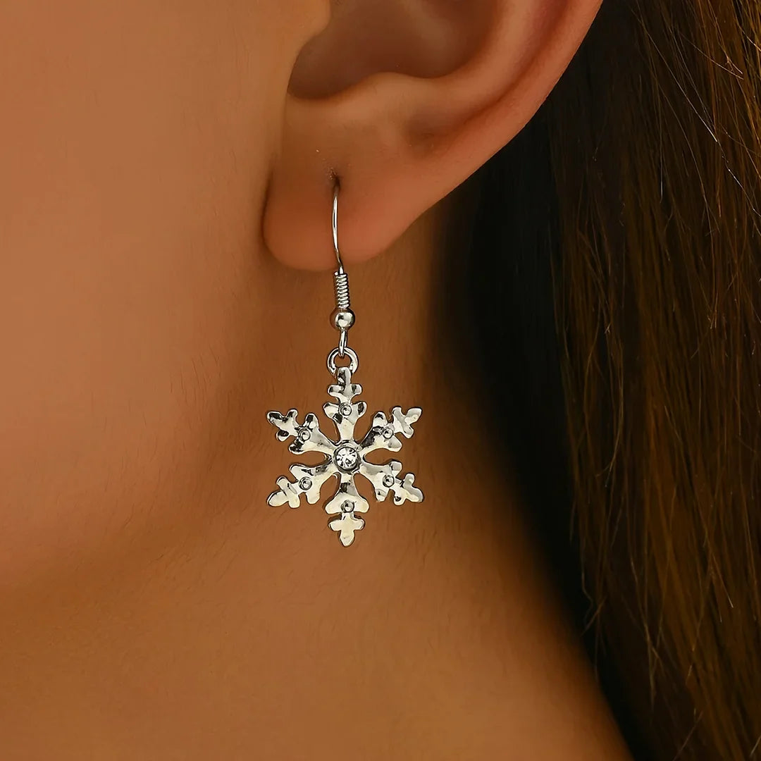 Brincos pendentes elegantes com flocos de neve natalinos