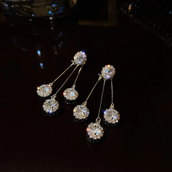 Brincos Triade de Zircónia Banhados a Ouro
