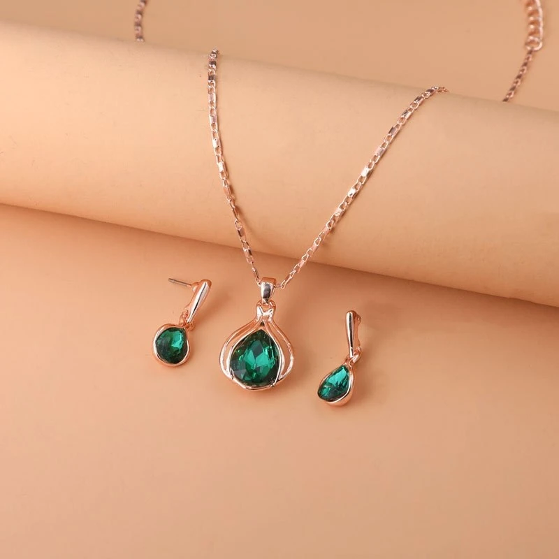 Conjunto de colar & brincos em cristal verde e ouro