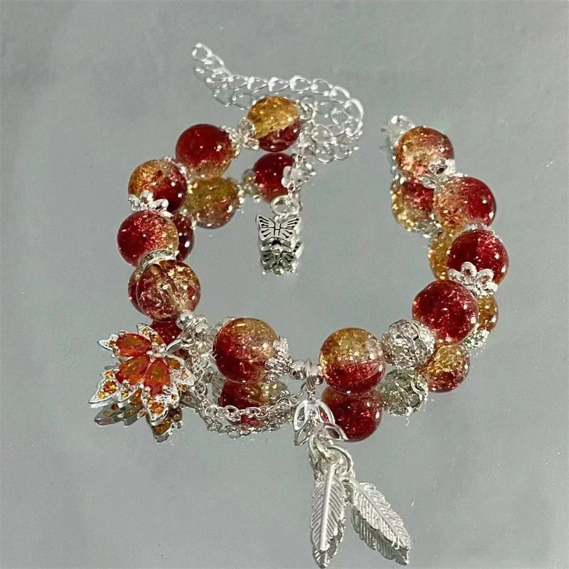 Pulseira com folha de outono prateada e borboleta
