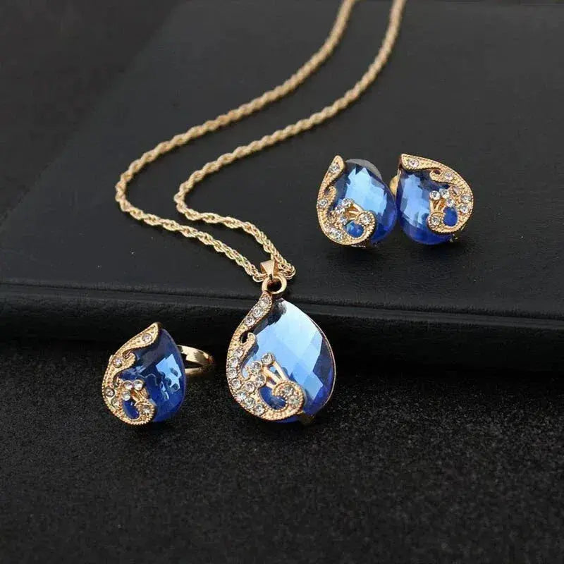 Conjunto de Colar e Brincos em Cristal Azul com Dourado