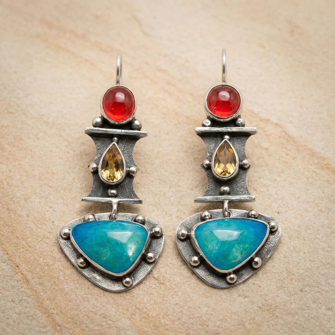 Brincos vintage com zircão azul em forma de gota de água