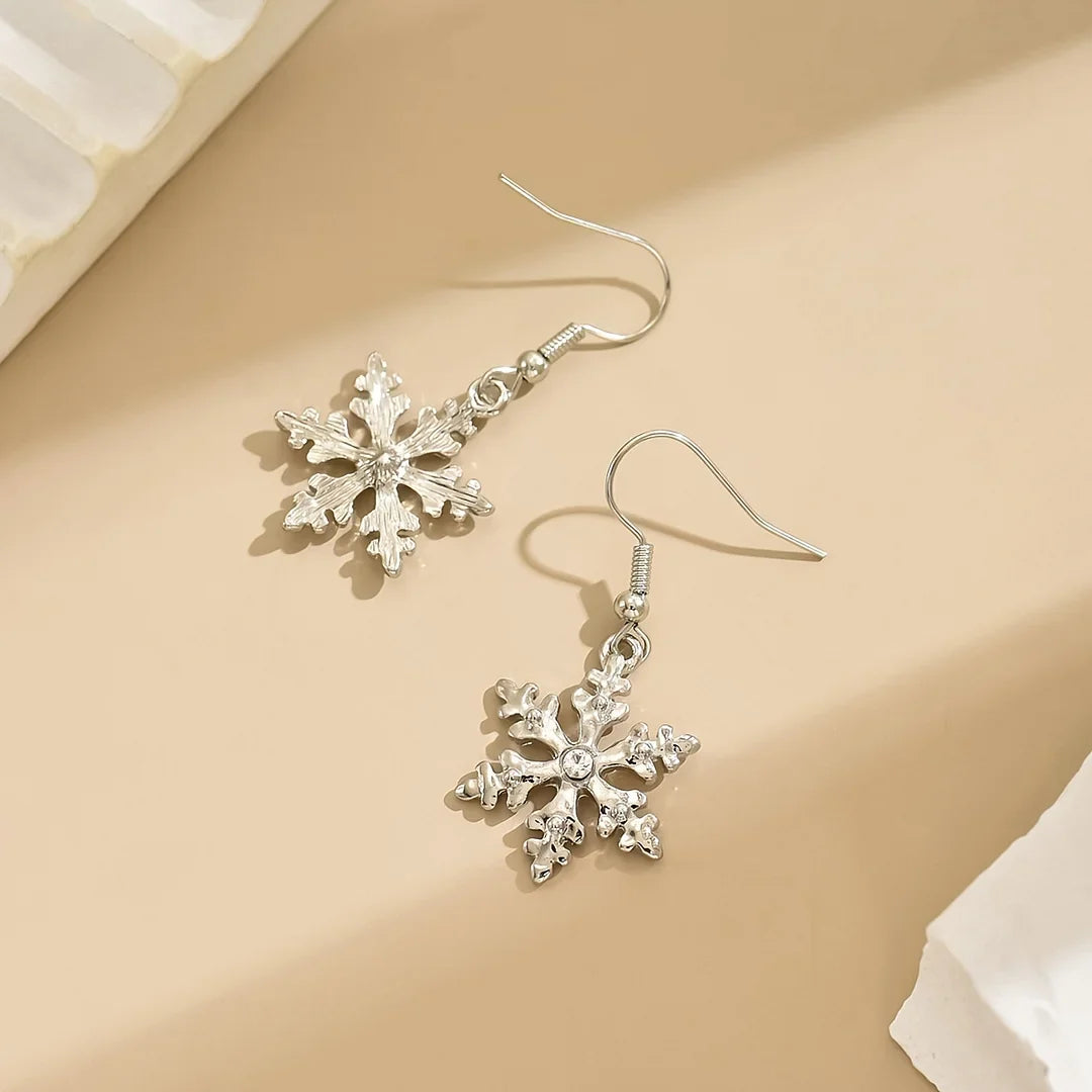 Brincos pendentes elegantes com flocos de neve natalinos