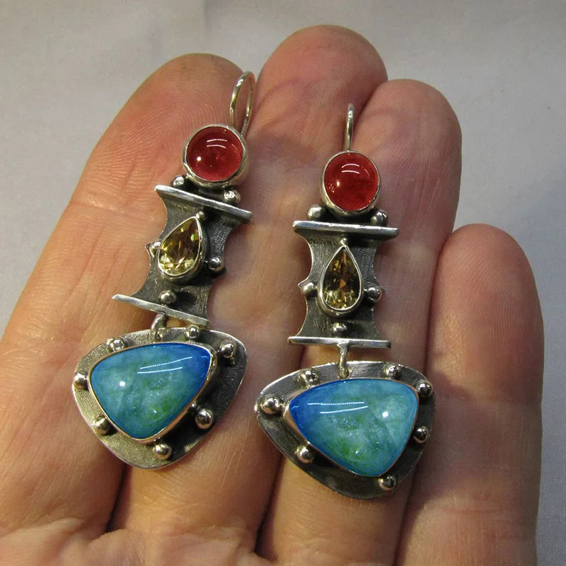 Brincos vintage com zircão azul em forma de gota de água
