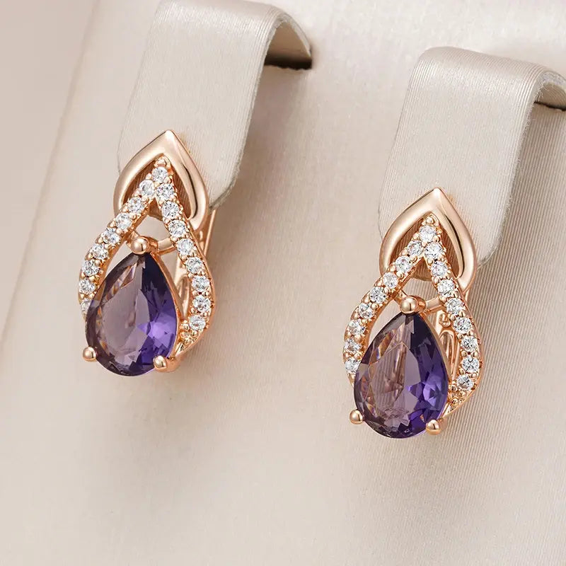 Brincos Dourados Elegantes com Cristal Roxo Pendurado